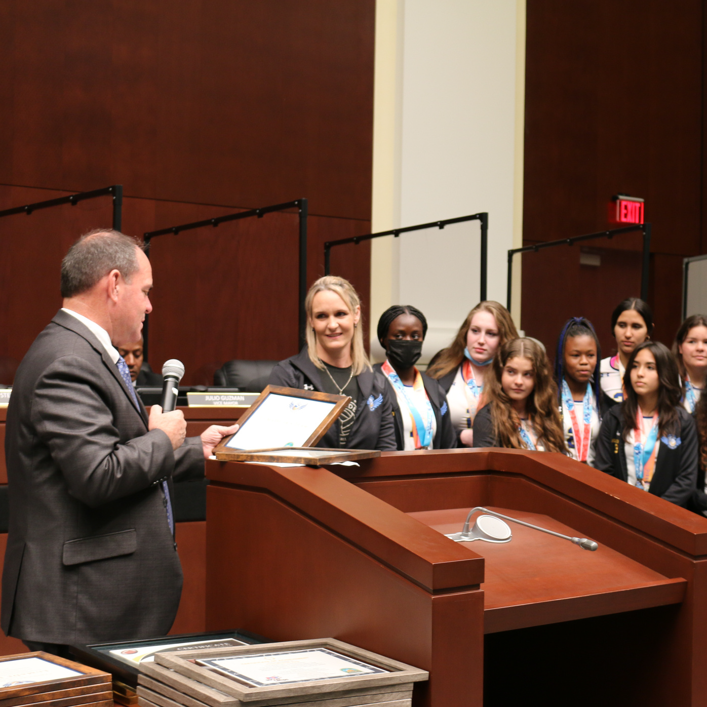 Mayor Losner Presenting Award to Volleyball Team 