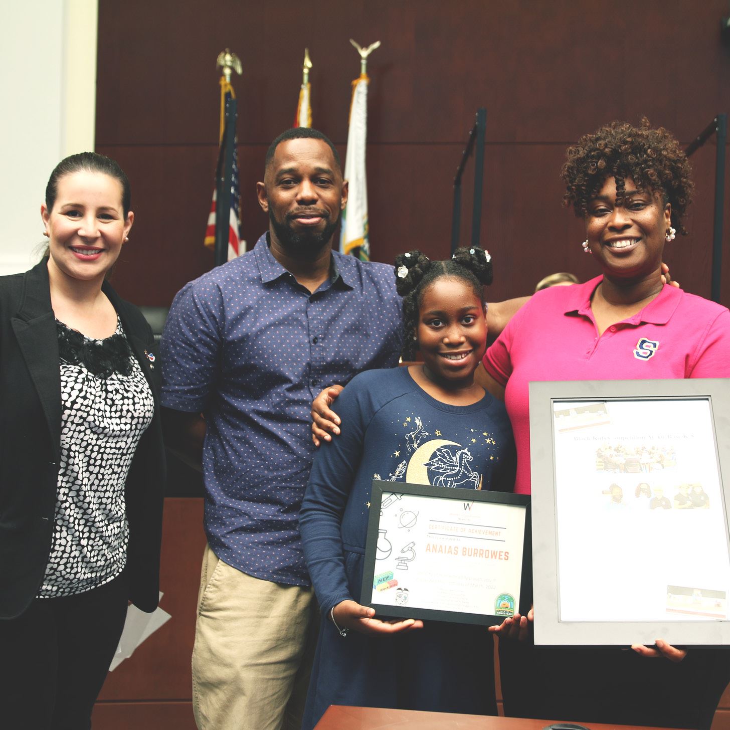 Avila presenting Certificate to student 