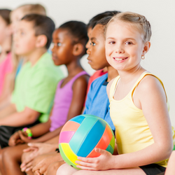 Kid Holding Volleyball